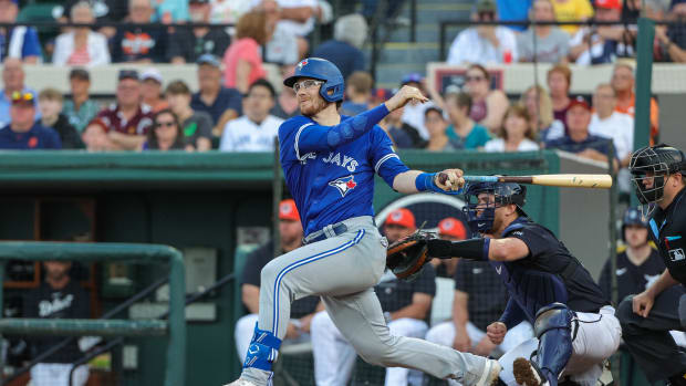 Mar 7, 2024; Lakeland, Florida, USA; Toronto Blue Jays catcher Danny Jansen (9) bats during the first inning against the Detroit Tigers at Publix Field at Joker Marchant Stadium.